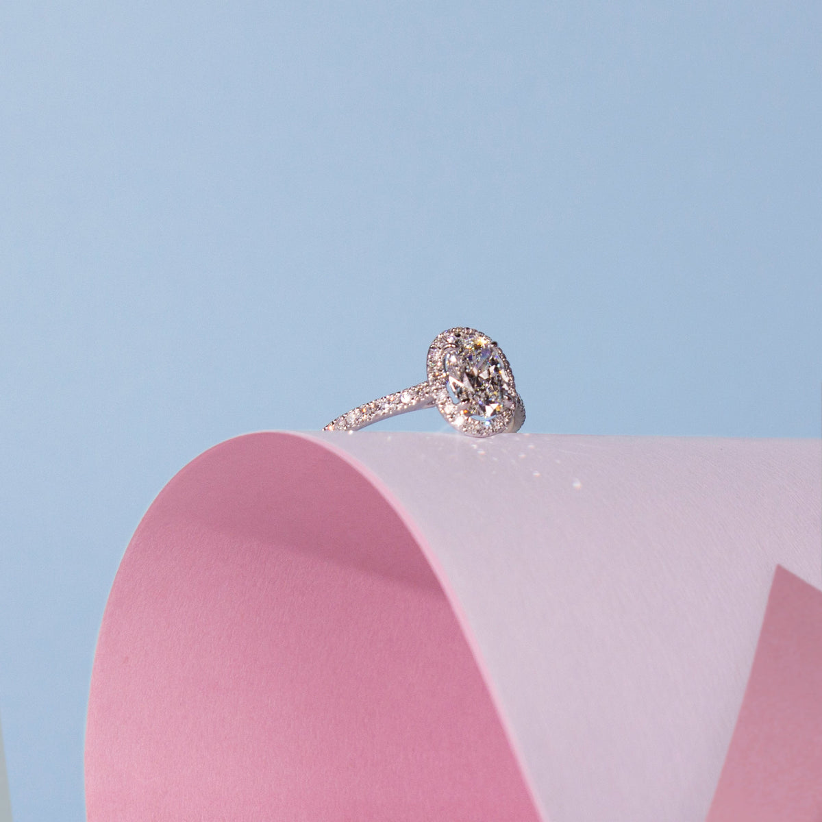 Oval Cut & Diamond Halo Setting Engagement Ring